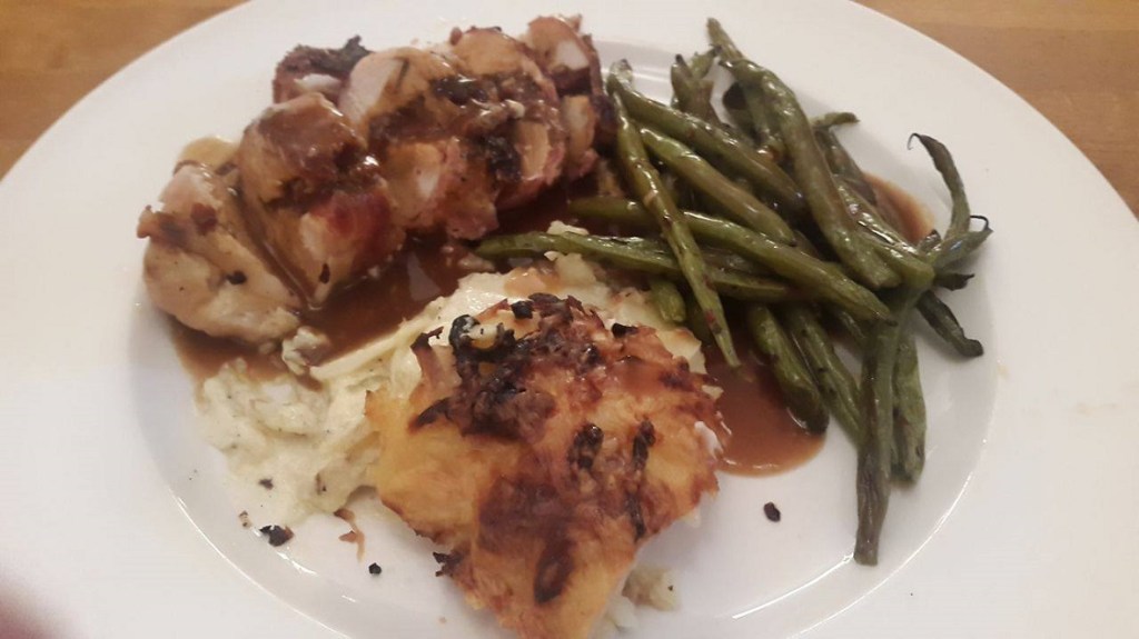 Stuffed chicken breast, wrapped in bacon with dauphinoise&nbsp;potatoes
