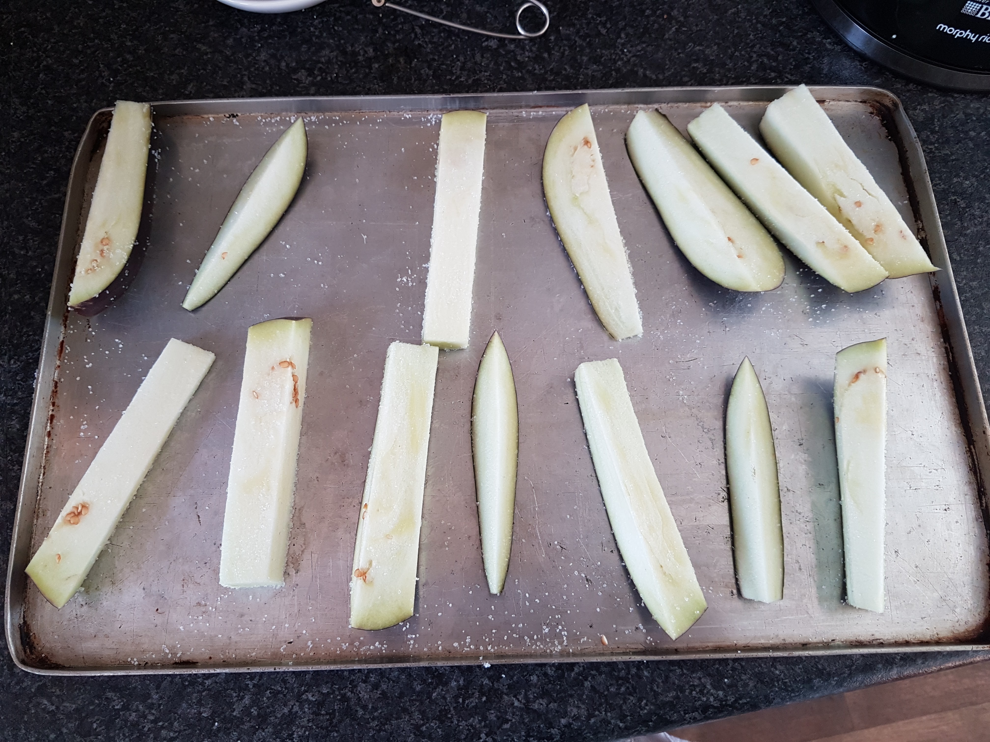 Aubergine cut into thick strips for the warm salmon and potato salad
