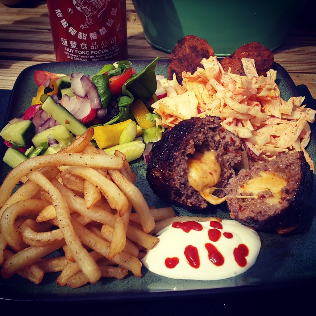 Spicy Mexican cheese-stuffed meatballs with homemade&nbsp;coleslaw