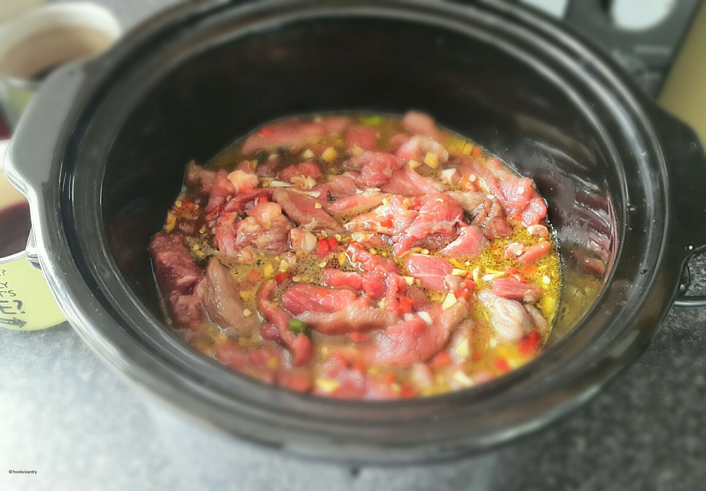 Mongolian-style beef cooking in the slow cooker